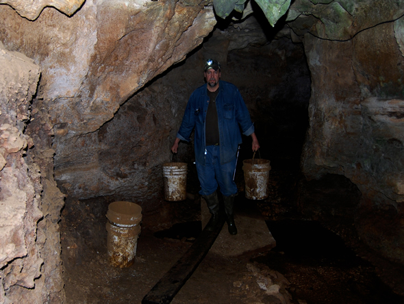 Kevin Carrying Mud Buckets